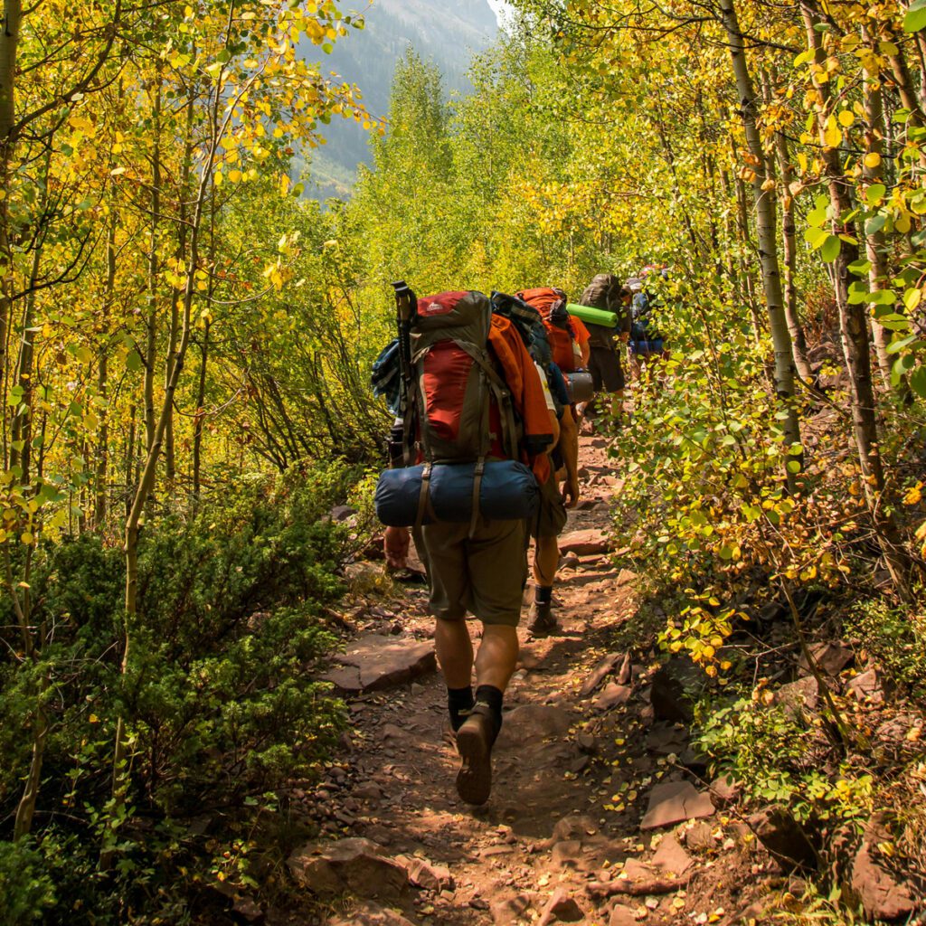 A group of campers on a trail