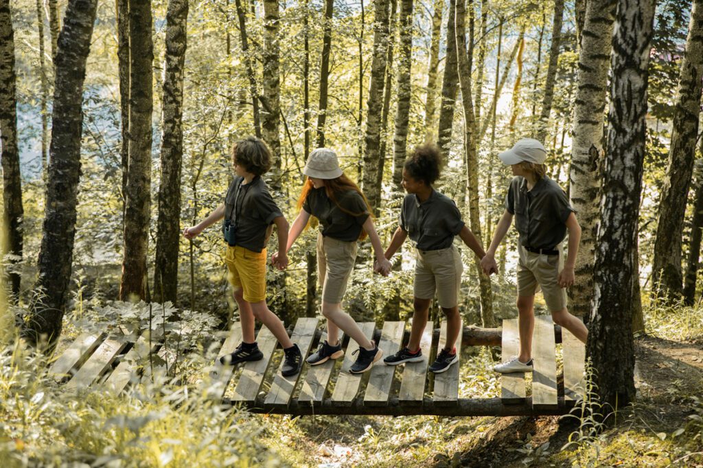 kids learning how to cross a bridge