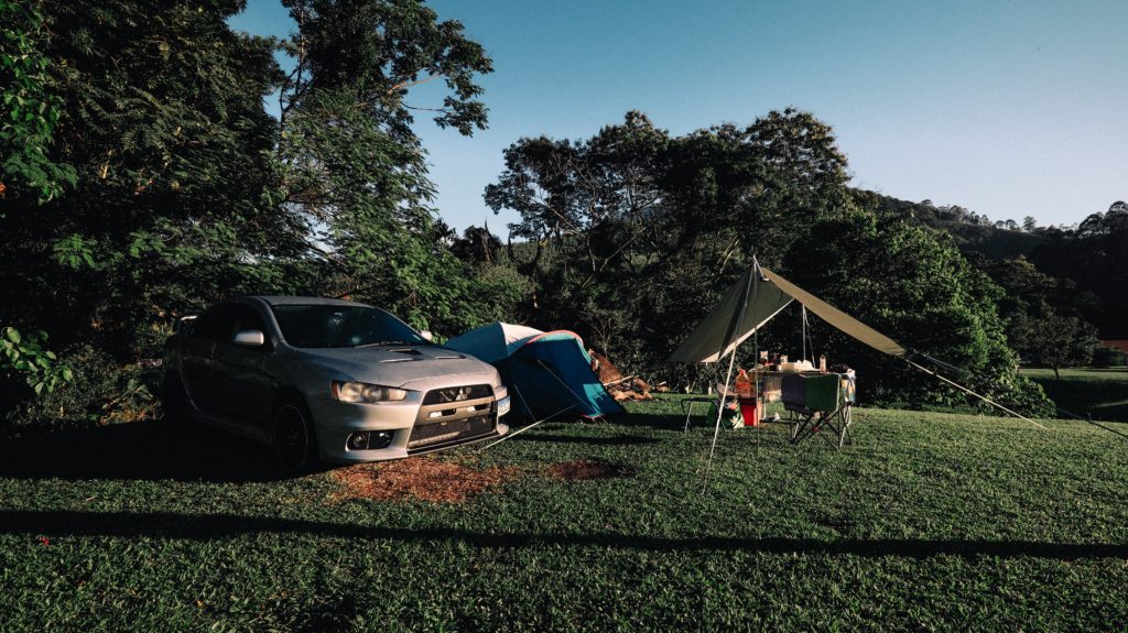 A car parked near a campsite