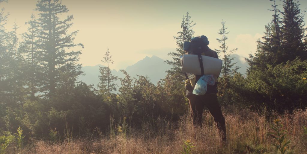 A man backpacking