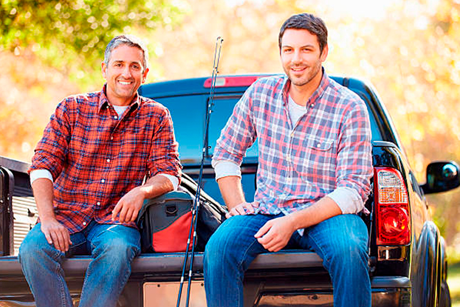 Two Men Sitting on Pick up
