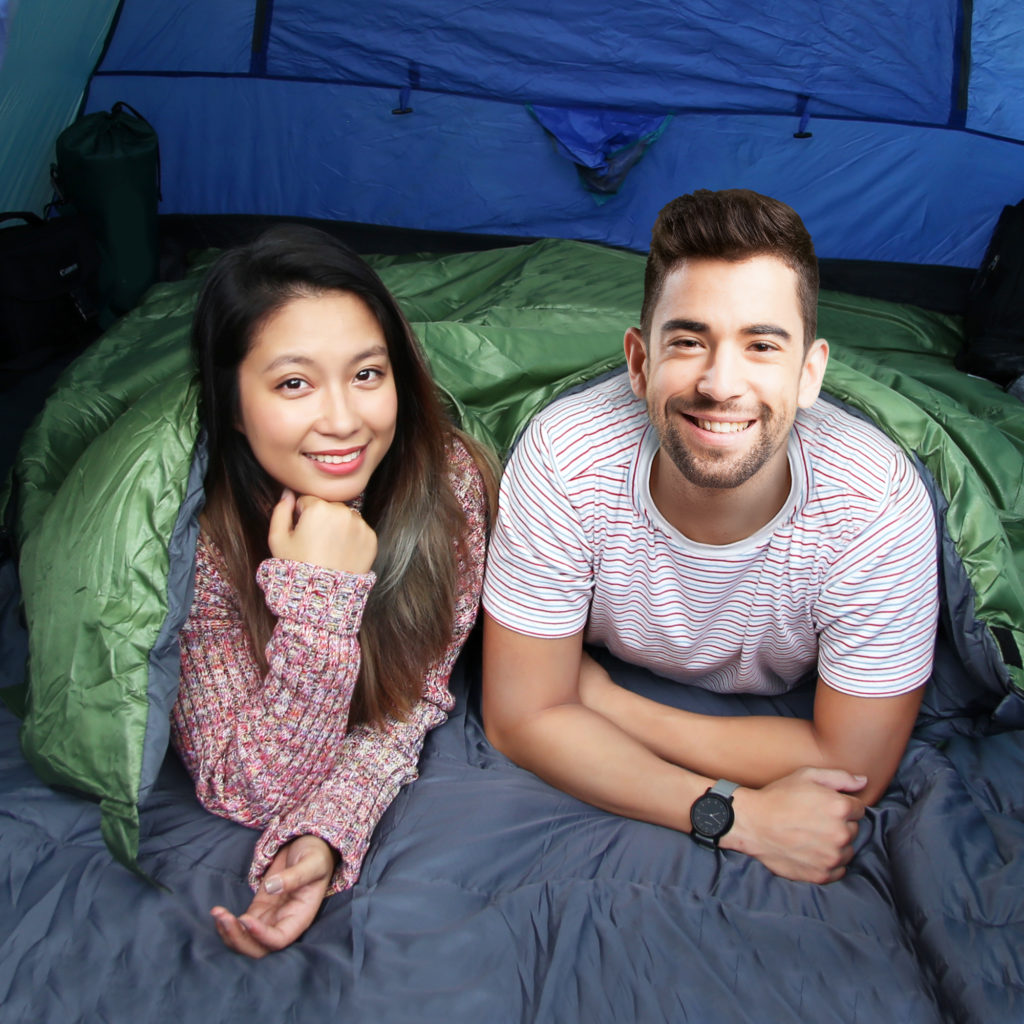 Couple using 2 connected sleeping bags