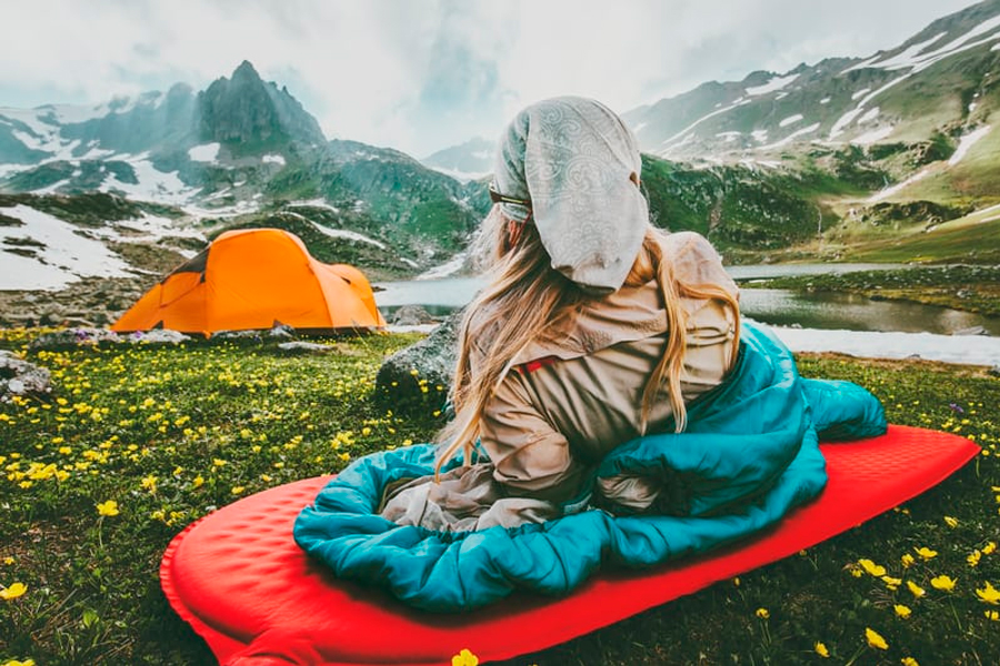 Women sittin on sleeping pad