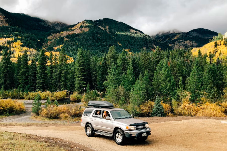 SUV camping in wild