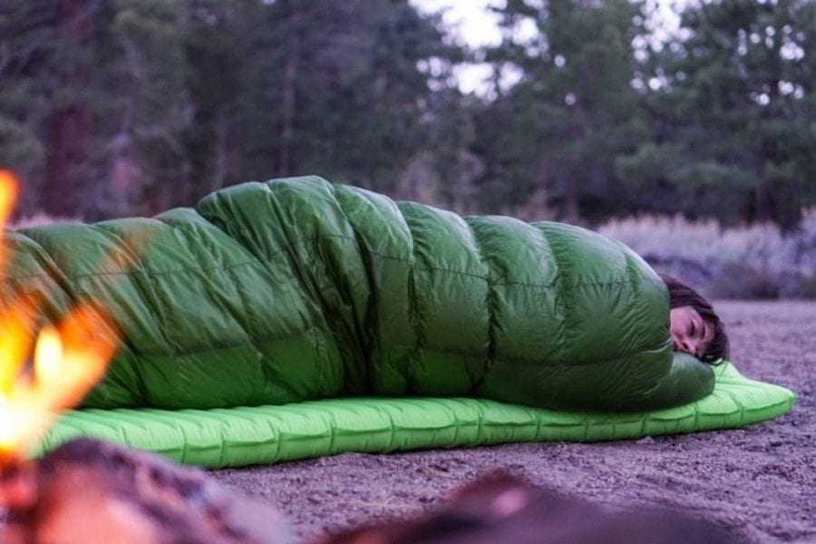 Woman sleeping in sleeping bag