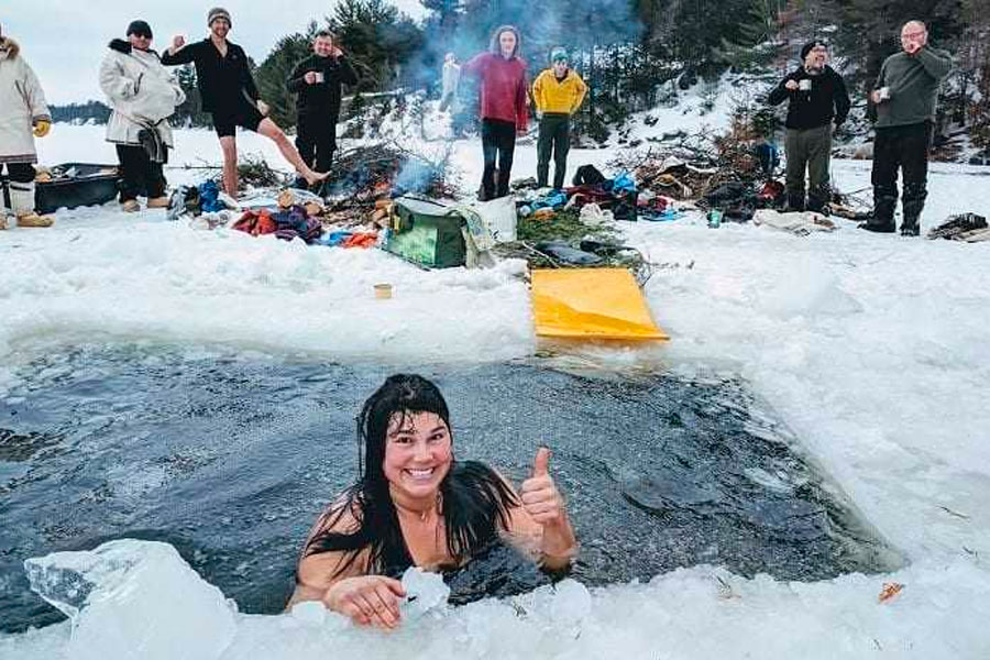 Woman Swimming In Cold Water