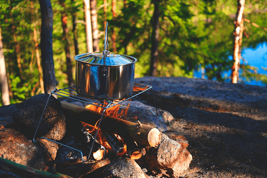 Making camping food in a pot