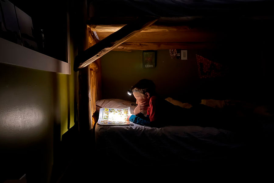 child using headlamp