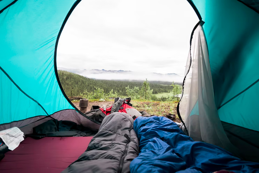 couple sleeping in tent
