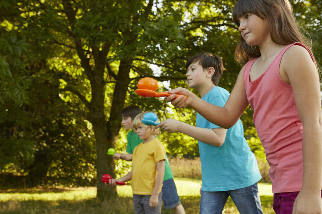 kids playing egg race