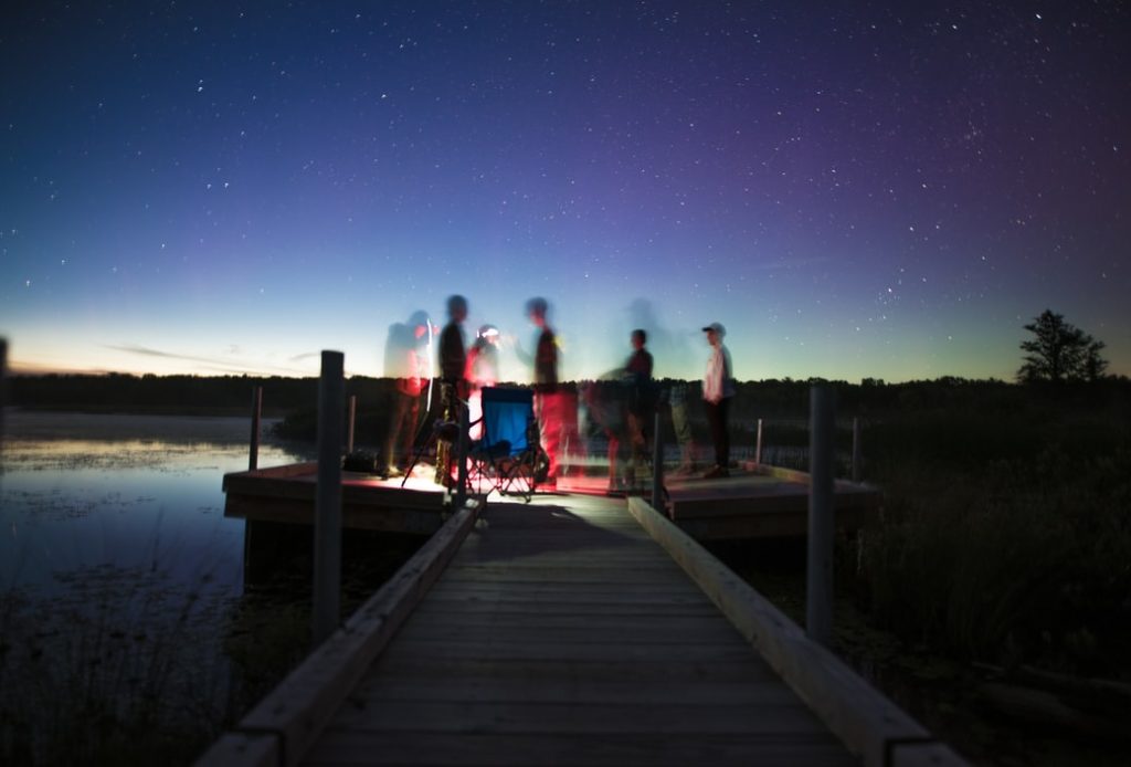 people on dock camping