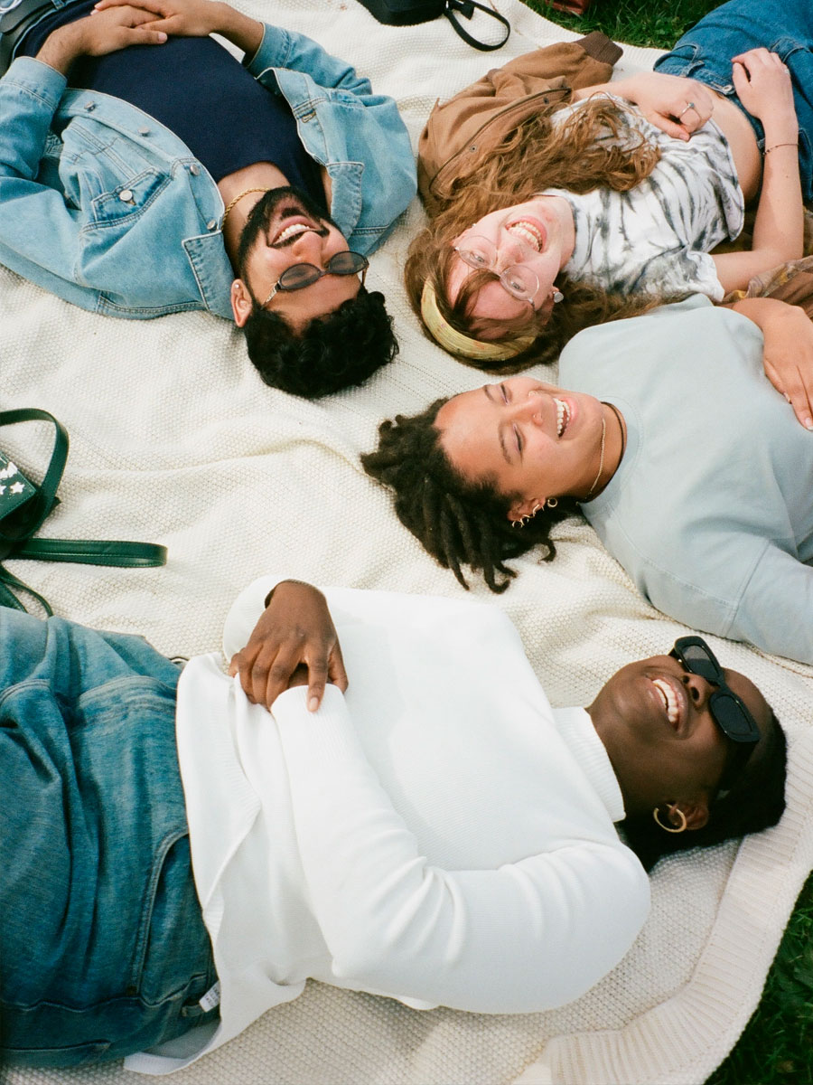 people on picnic blanket