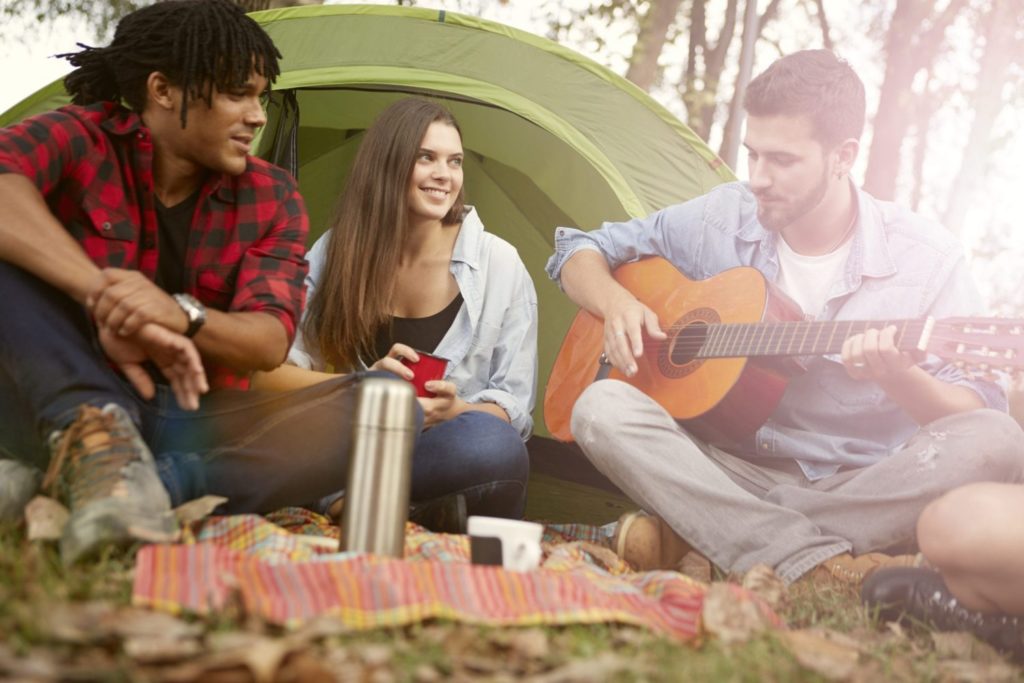 Playing Guitar while Camping