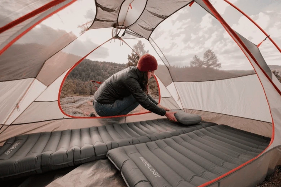 putting sleeping pad in tent