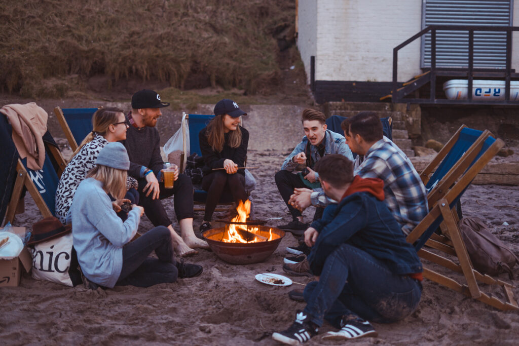 Family Gathered around a fire pit