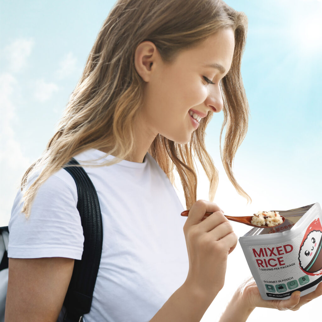 3-1 A hiker relishing a mixed rice meal conveniently packaged in a pouch