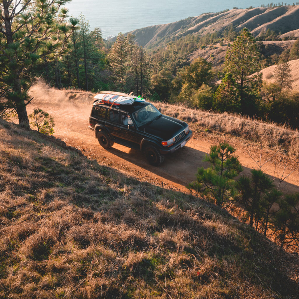 A car traveling through a mountain