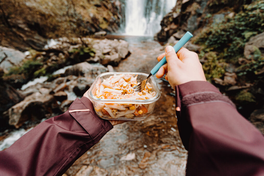 enjoying pasta outdoors