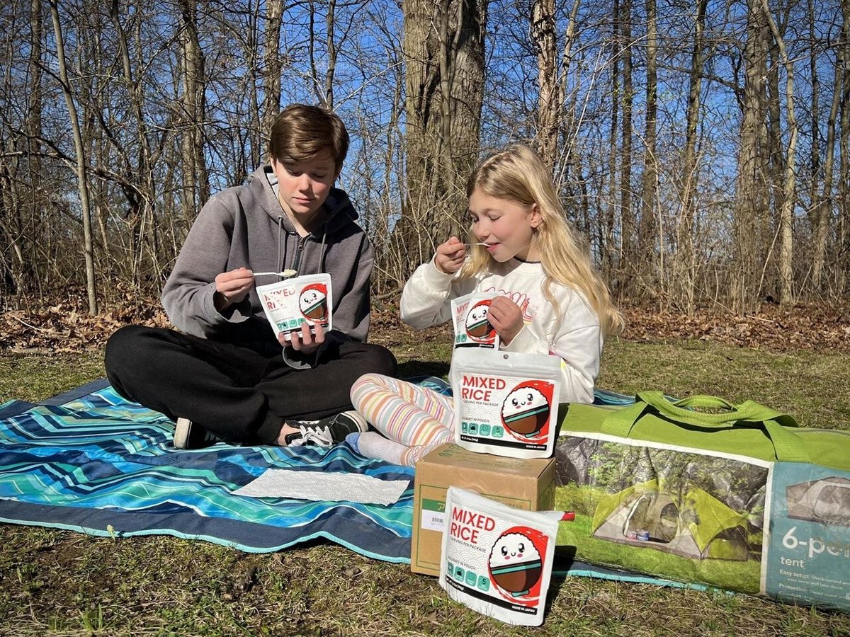 two-kids-spending-time-together-eating-yummy-rice