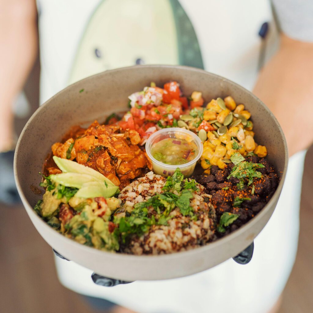 person-holding-salad-in-bowl